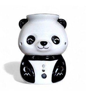  gros plan sur l’ouverture supérieure du brûle-parfum où l’on verse les huiles essentielles