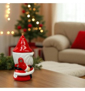  papa noël brûle-parfum utilisé comme centre de table lors d’un repas de noël