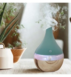  humidificateur d'air design diffusant une brume silencieuse dans un bureau