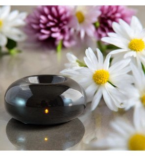  détail du couvercle du diffuseur noir montrant la finition soignée de la céramique