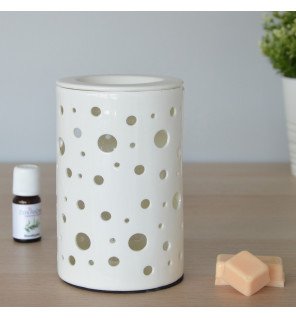  vue latérale du diffuseur en céramique avec reflets de lumière sur la surface