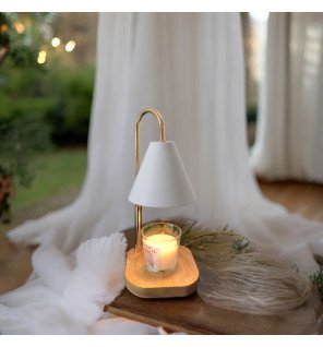  diffuseur de chaleur douce pour bougies parfumées avec une bougie insérée à l’intérieur