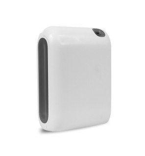  diffuseur professionnel posé sur une étagère en bois clair dans un environnement zen