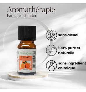  huile essentielle orange douce 10 ml entourée de quartiers d’orange fraîche pour illustrer la naturalité