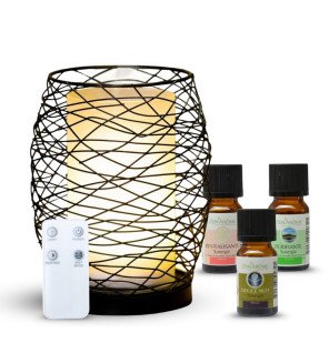  ensemble diffuseur volupsia et huiles essentielles sur une table basse dans un intérieur moderne