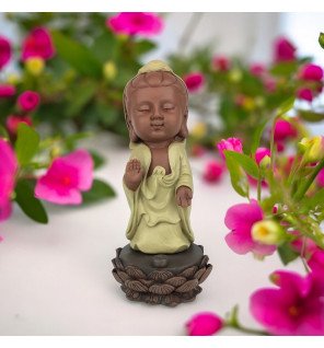 statue bouddha porte-encens akshobhya de zen'light posée sur une table