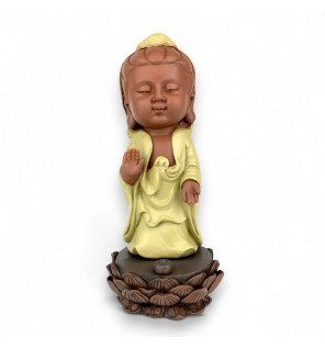  vue de profil de la statue porte-encens diffusant une légère fumée